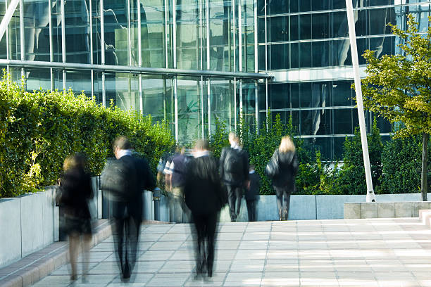istock Business People Walking in Financial District, Blurred Motion 182486880