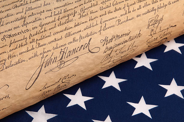 istock Declaration of Independence and Flag 182487502