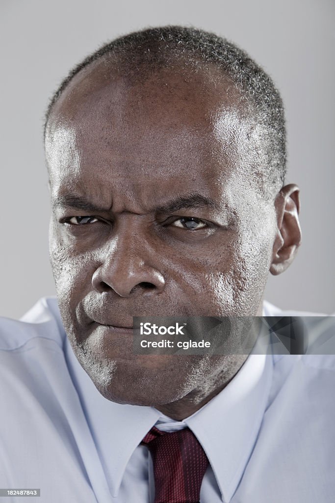 Homme d'affaires noir Détermination - Photo de Contrarié libre de droits