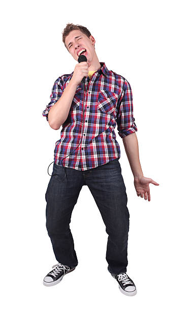istock Casual male singing loudly into microphone 182488848
