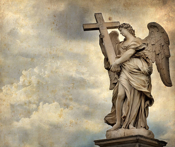 istock Angel with the Cross 182489038