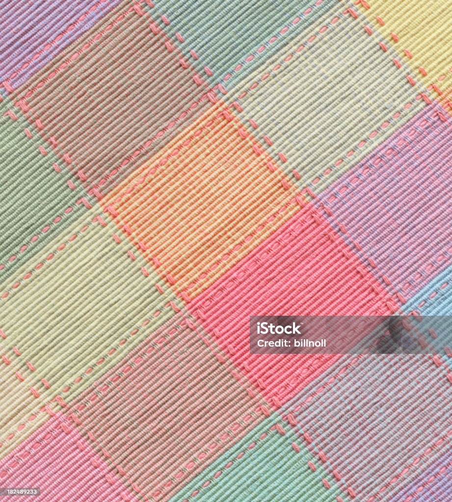 checked fabric in spring colors This high resolution gingham plaid stock photo is ideal for backgrounds, textures, prints, websites and many other tartan style fabric or paper art image uses! Quilt Stock Photo