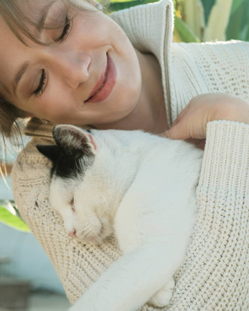 istock Pet owner and her feline friend. 1824896039