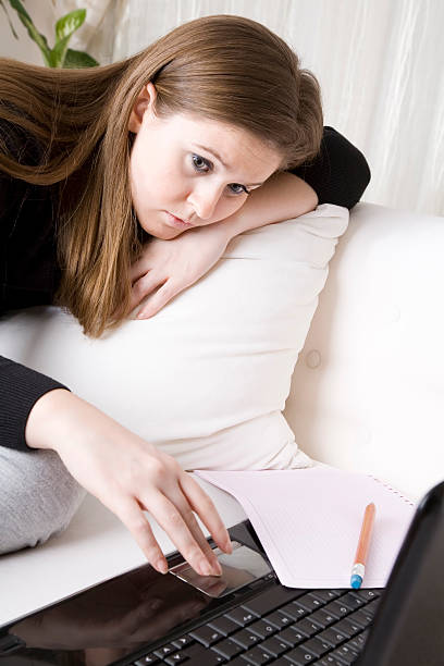istock girl on laptop tired 182489834