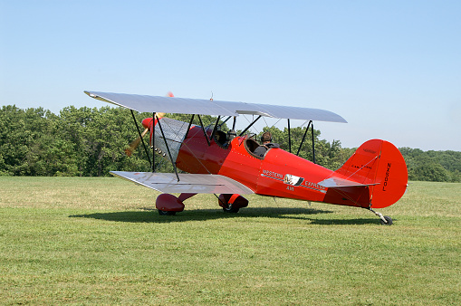 Wilkinson Lorin L HATZ XB-II biplane taxiing at an airport with grass taxiway and runway. Blakesburg, Iowa, USA on August 31, 2008.