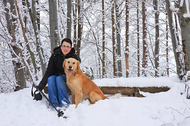 Woman and the dog, winter portrait