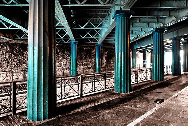 Columns under an old railway overpass stock photo