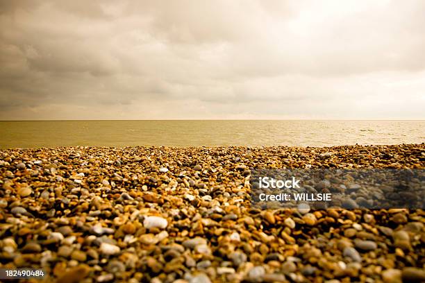 Fine Art Style Shingle Beach With Dramatic Lit Sky Stock Photo - Download Image Now - Aldeburgh, Beach, Beauty In Nature