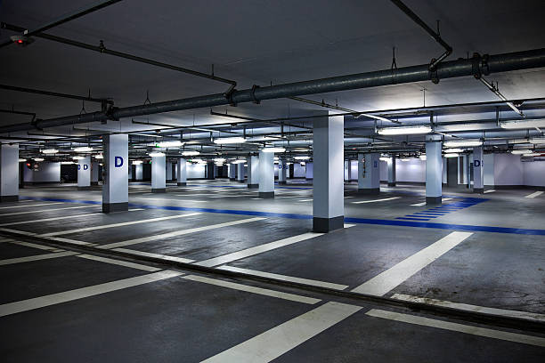 Empty Parking Garage Empty Parking Garage parking lot stock pictures, royalty-free photos & images