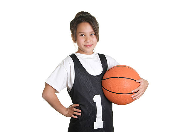 süße neun jahre altes mädchen-basketball player - 9 year old stock-fotos und bilder