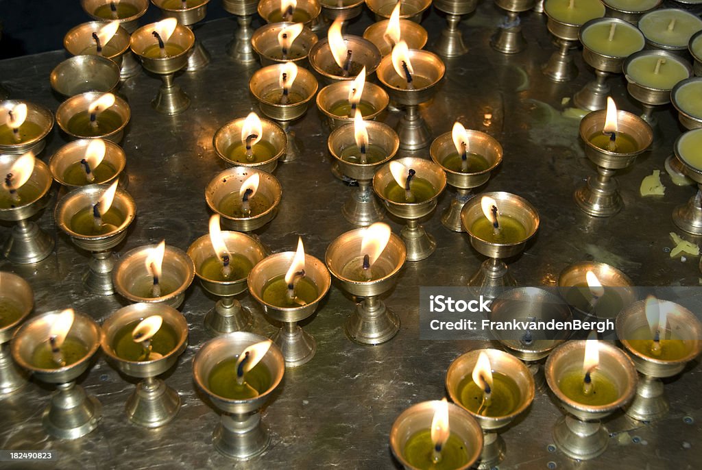 Butter Lamps Tibetan butter lamps at a monastery. Losar Stock Photo