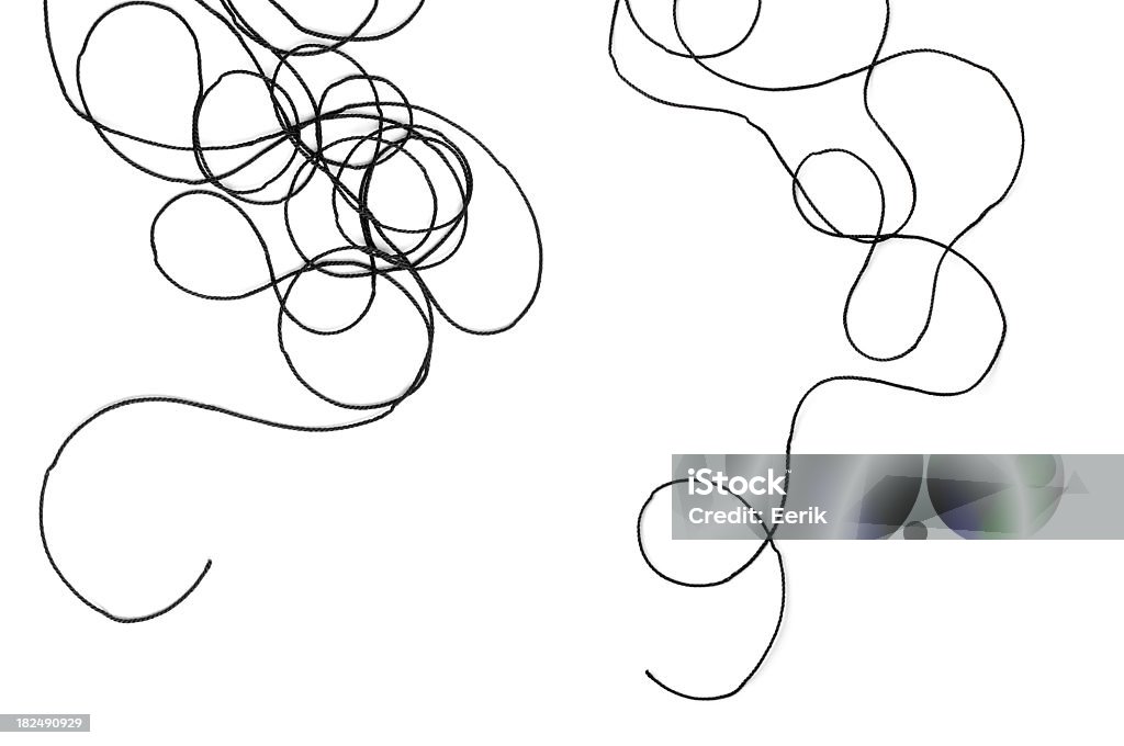 Image of tangled black thread isolated on a white background Tangled black thread on white background. Abstract Stock Photo