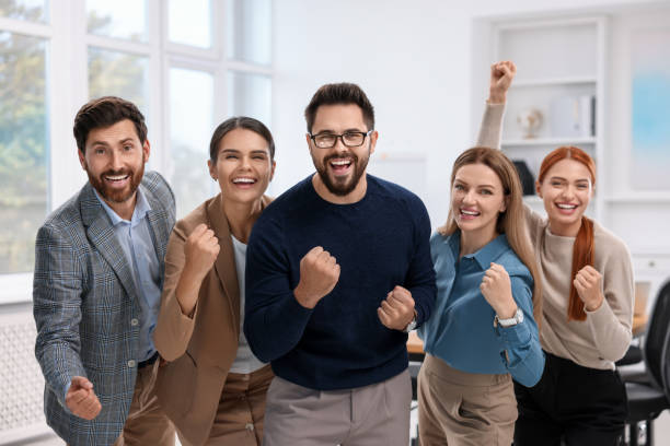 istock Team of employees celebrating success in office 1824911683