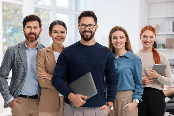 istock Portrait of happy employees in office. Team work 1824912217
