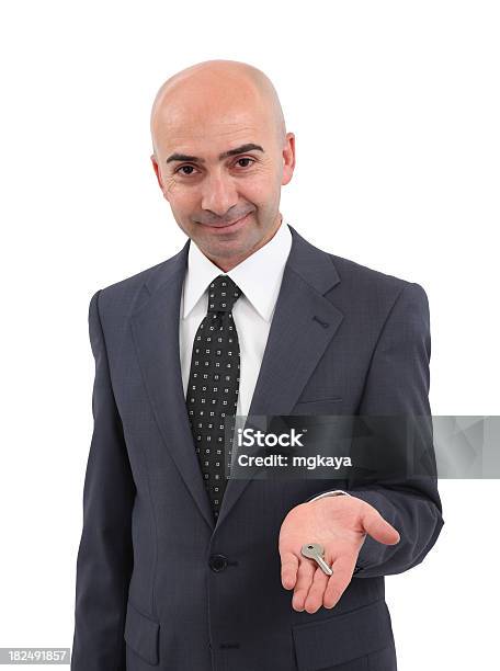 Businessman Holding Key Stock Photo - Download Image Now - 40-49 Years, Adult, Adults Only