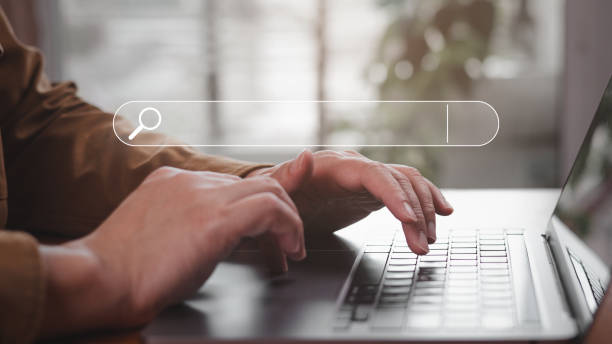 istock Man typing on computer keyboard to search for information with AI assistant. 1824919685