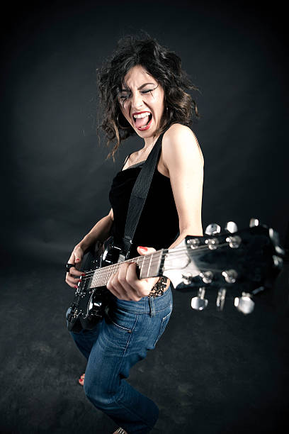istock Girl and Electric Guitar 182492285