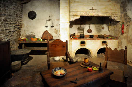 Wide angle view of a food preparation area built in the early 1800's at the Santa Barbara mission in California.