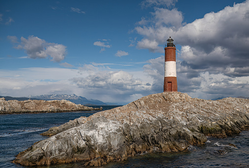 The lighthouse at world's end. Island with lighthouse.