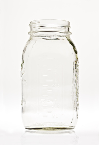 Glass jar for cereals isolated on white background. File contains clipping path