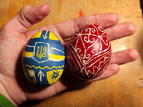 Two homemade Ukrainian Easter Eggs in two different styles
