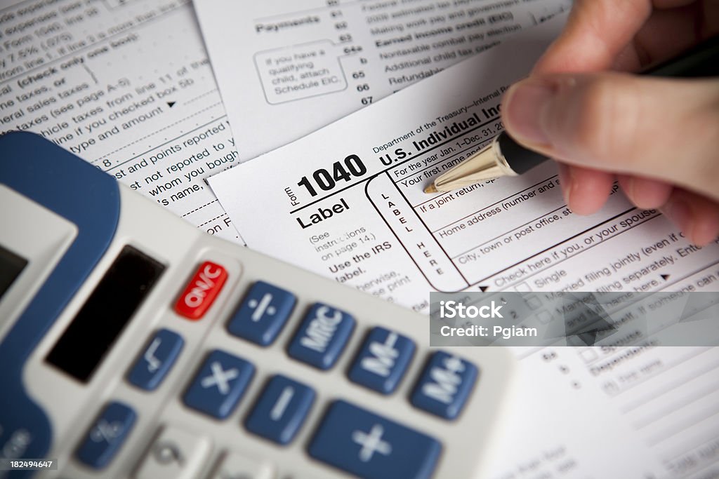 Financial IRS tax forms Income tax numbers at the accountants office 1040 Tax Form Stock Photo