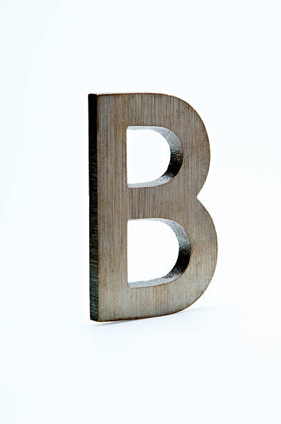 lettera b in ottone - letter b brass alphabet text foto e immagini stock
