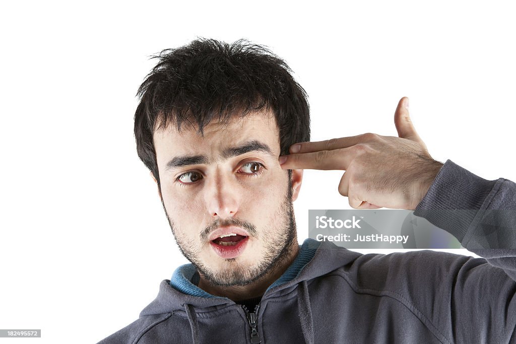 Don't Come, I will shot myself "Don't Come, I will shot myself. Young Men shoting himself with fingers. XXXL Size" 20-29 Years Stock Photo