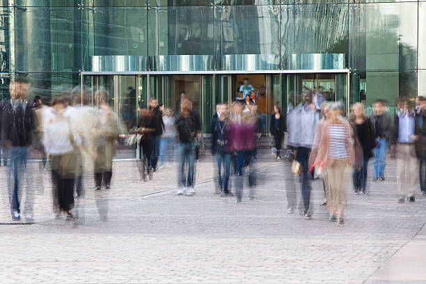 istock Business People Leaving Office Building, Blurred Motion 182495667