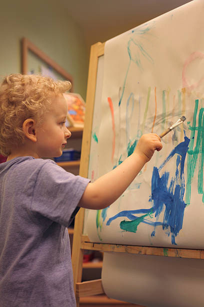 istock Little Boy Painting a Picture 182496279