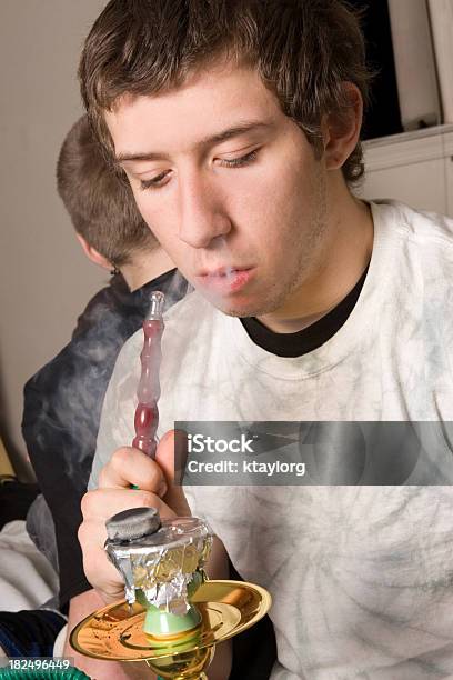 Teen Smoking From Hookah Pipe Stock Photo - Download Image Now - Hookah, Teenager, Smoke - Physical Structure