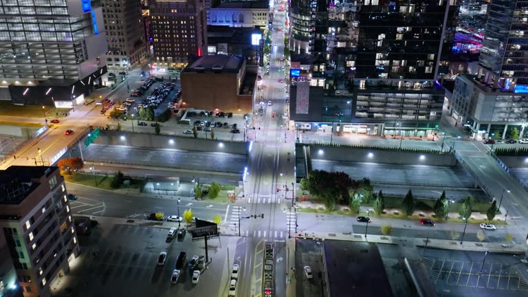 Forward Drone Shot Following Cable Car in Downtown Kansas City, Missouri at Night