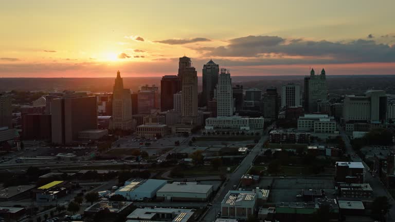 Retreating Establishing Aerial Shot of Kansas City, Missouri at Sunset