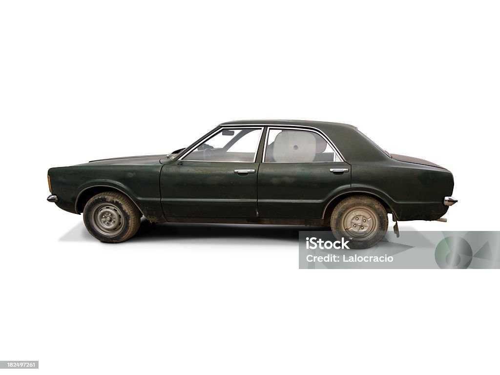 Classic Ford Taurus Dirty old Ford Taurus from the 70's. Side view. Car Stock Photo