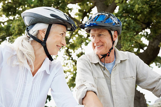 istock Happy retired couple during their bicycle ride 182497625