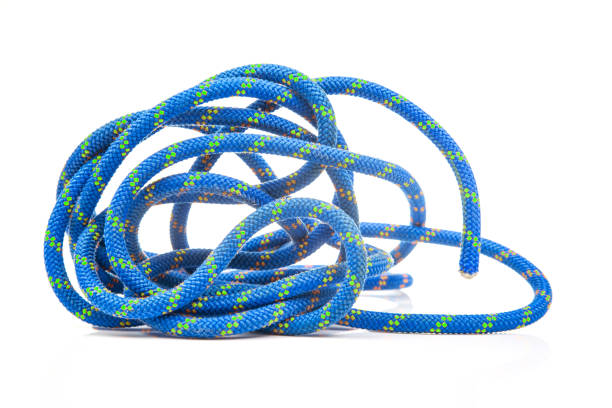 istock durable colored rope for climbing equipment on a white background. climbing rope. coil of braided cable. item for tourism and travel 1824978972