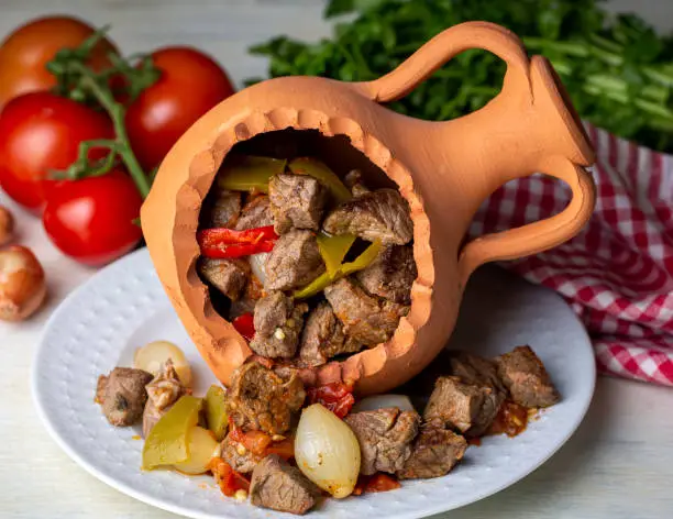 Authentic Turkish Testi Kebab cooked in earthenware waterjug, Turkish name; Testi kebabi
