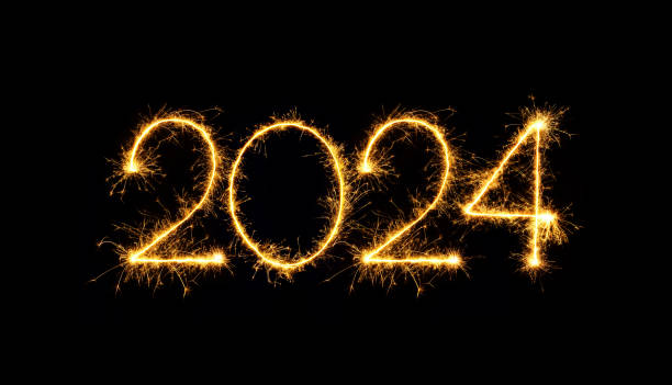 Sparkling burning numbers Year 2024 isolated on black background