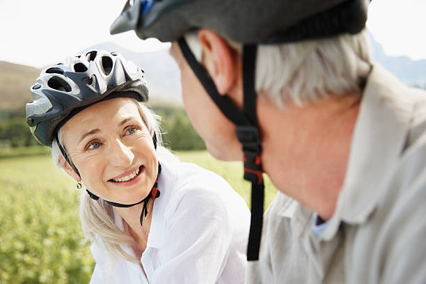 istock Smiling couple enjoying a bicycle ride in the fields 182498621