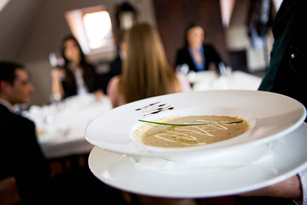 zuppa di servizio - restaurant waiter table wait staff foto e immagini stock