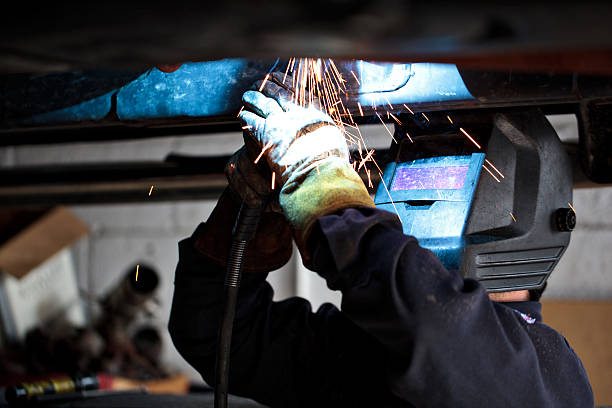 istock front view of welding man with mask 182499221