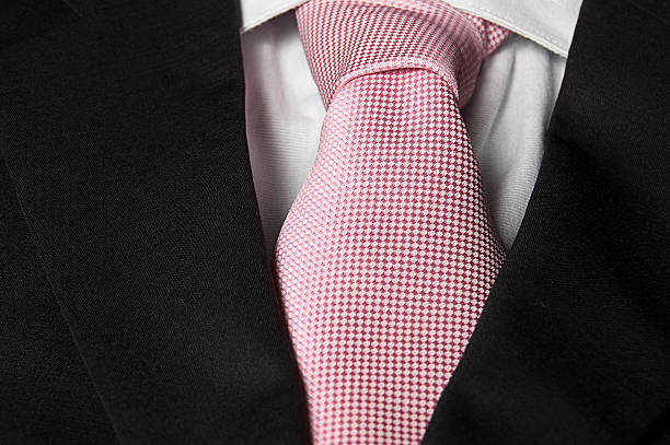 istock Pink Silk Necktie on Black Wool Suit 182499477