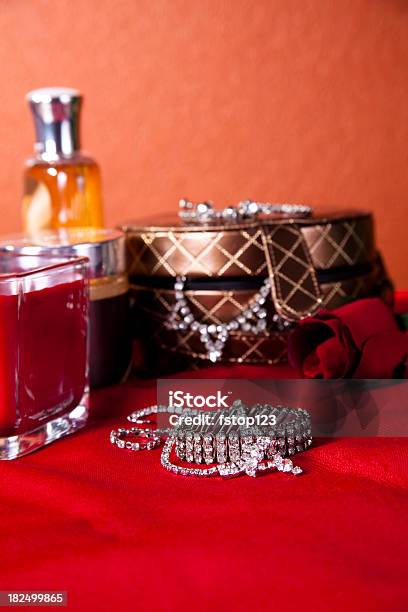 Diamond Jewelry Box Jars Candle And Red Rose Ladies Accessories Stock Photo - Download Image Now