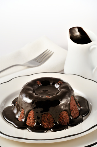Decadent chocolate lava cake glazed with a dark chocolate ganache.  
