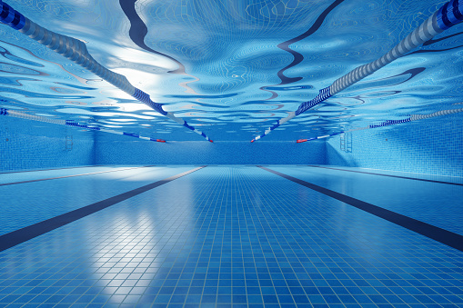 A large swimming pool with clear blue water in the hotel for relaxation and relaxation