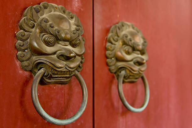 istock Asian Lion Door Knockers on Red Background 182501076