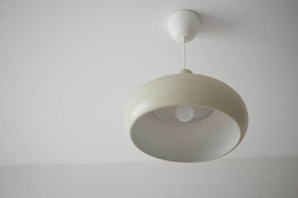 istock colorful ceiling lamp hanging in a room , 1825024469