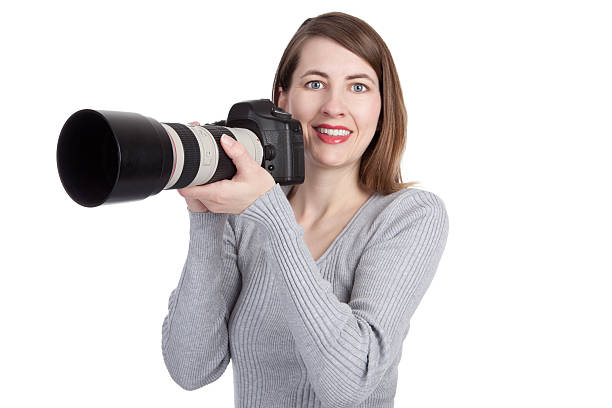 istock Smiling Photographer With Digital SLR Camera 182502831