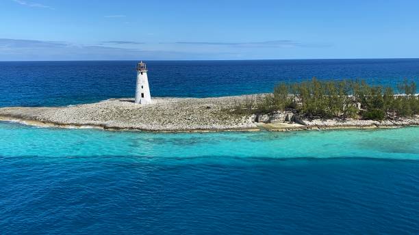 istock Caribbean Blue Waters: Sandbank Oasis with Lighthouse 1825029317