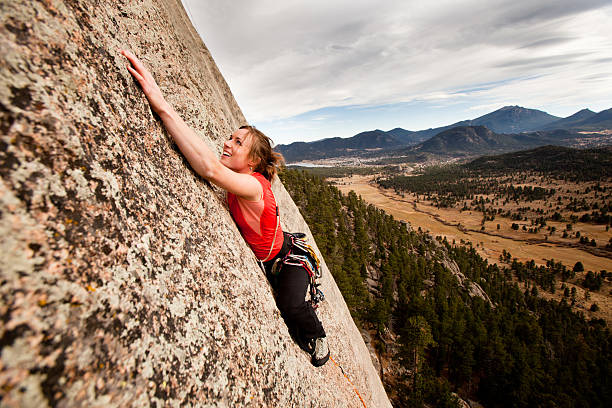 istock Young Woman Rock Climbing 182503031